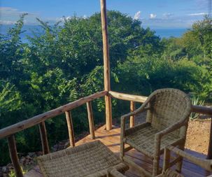 veranda view over lake albert nature kikonko lodge